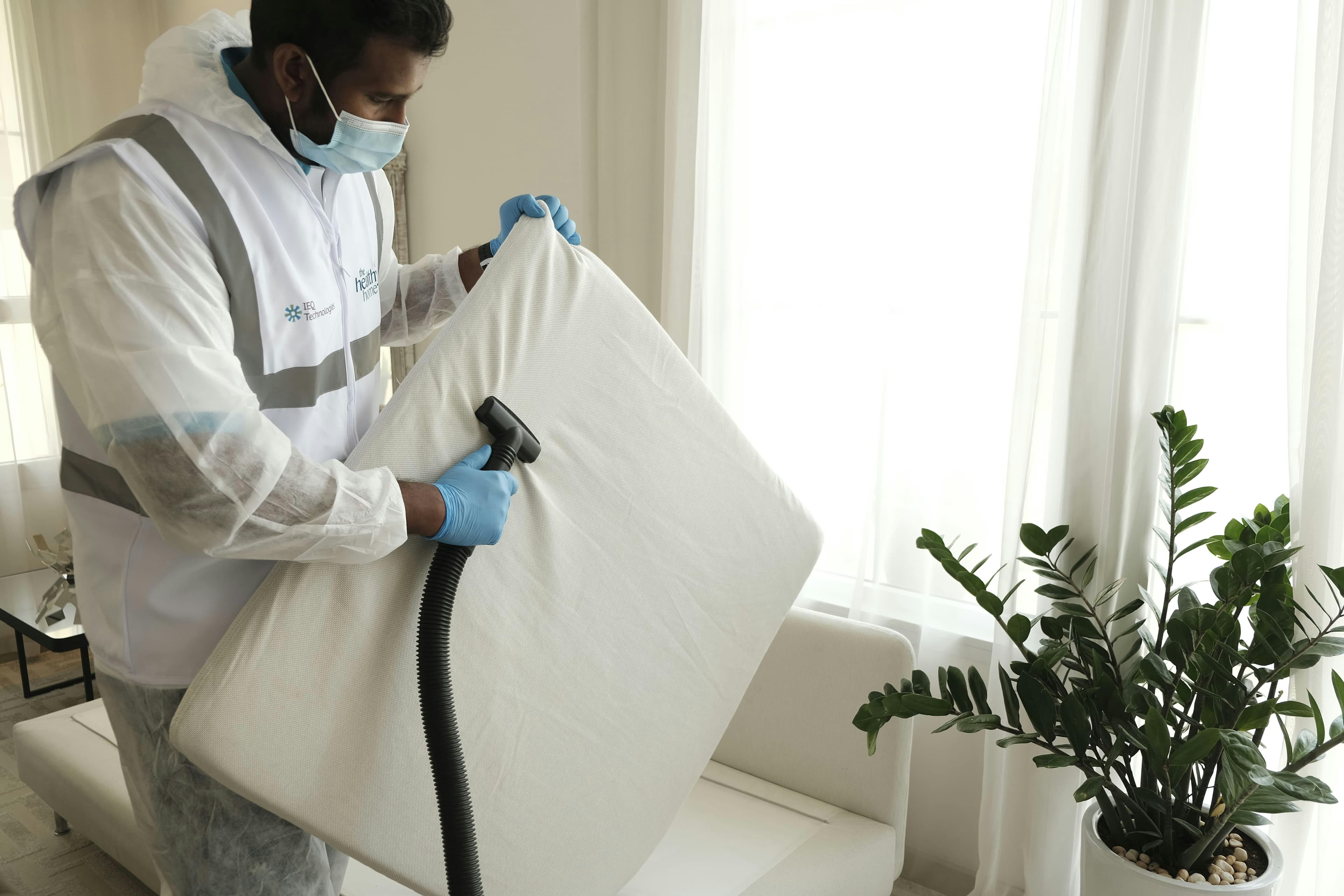 Pest control technician using professional equipment
